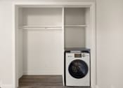 Thumbnail 11 of 40 - a white washer and dryer in a closet
