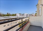 Thumbnail 17 of 54 - Balcony at Woodland Trio Apartments, California