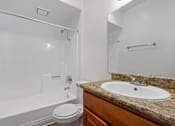 Thumbnail 20 of 54 - Bathroom With Bathtub at Woodland Trio Apartments, California