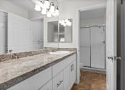 Thumbnail 38 of 60 - a bathroom with a sink and a toilet at The Meadows at Westlake Village Apartments, CA, 91361