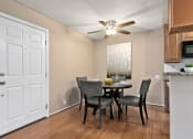 Thumbnail 11 of 41 - Apartments for Rent in Mar Vista - Vista - Jones & Jones - Dining Area with Wood-Style Flooring and a Ceiling Fan