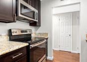 Thumbnail 17 of 60 - Kitchen at The Meadows at Westlake Village Apartments,California