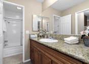 Thumbnail 16 of 41 - Mar Vista Apartments Bathroom with Upgraded Counter Tops and Cabinets