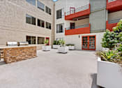 Thumbnail 22 of 54 - Outdoor Seating Area at Woodland Trio Apartments, California, 91601