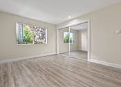 Thumbnail 29 of 44 - Bedroom with Hardwood Flooring and Natural Light at Parkway Terrace Apartments, Culver City