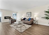 Thumbnail 9 of 44 - Spacious living room at Parkway Terrace Apartments, Culver City, California