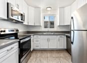 Thumbnail 23 of 47 - Sherman Oaks Apartments - Krystal Terrace - Modern Kitchen with Stainless Steel Appliances