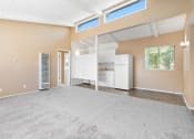 Thumbnail 3 of 15 - Vaulted Ceilings and Berber Carpet Los Angeles Apartment