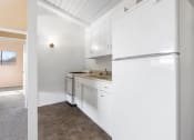 Thumbnail 5 of 15 - Kitchen in one bedroom apartment Los Angeles