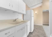 Thumbnail 4 of 15 - St. Andrews Apartments Kitchen with upgraded cabinets
