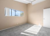 Thumbnail 11 of 15 - Bedroom with Vaulted Ceilings in Los Angeles Apartment