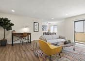 Thumbnail 3 of 38 - a living room with a couch and a desk