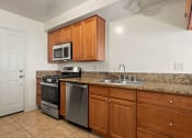 Thumbnail 38 of 38 - a kitchen with a sink and a counter top