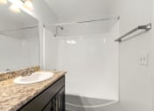 Thumbnail 46 of 60 - Bathroom with Spacious Granite Countertop at The Meadows at Westlake Village Apartments, CA, 91361