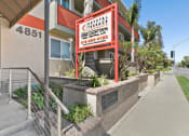 Thumbnail 43 of 47 - Apartments for Rent in Sherman Oaks - Krystal Terrace Apartments Exterior Monument Sign and Beautifully Landscaped Entrance