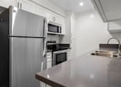 Thumbnail 32 of 69 - Fully Equipped Kitchen at Lombardi Apartments, Woodland Hills, CA, 91367