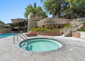 Thumbnail 48 of 60 - Jacuzzi Area with Lounge Chairs and Pool View at The Meadows  at The Meadows at The Meadows at Westlake Village Apartments,Westlake Village, California