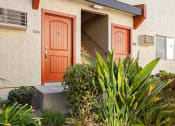 Thumbnail 34 of 41 - One-Bedroom Apartments In West Hills, CA - Topanga Canyon - Front Door Entrance Surrounded By Lots Of Lush Greenery
