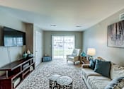 Thumbnail 22 of 25 - Spacious Living Room With Private Balcony at Abbey Ridge Apartment Homes, Oxford, 48371