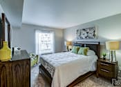 Thumbnail 21 of 25 - Bedroom With Expansive Windows at Abbey Ridge Apartment Homes, Oxford, MI