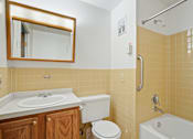 Thumbnail 29 of 30 - A bathroom with a toilet, sink, and bathtub at Independence Place Apartments, Ohio 44130