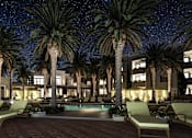 Thumbnail 10 of 12 - a rendering of a apartment pool at night with palm trees