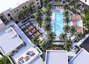 Thumbnail 4 of 12 - an aerial view of an apartment complex with a swimming pool and palm trees