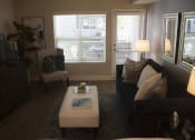 Thumbnail 44 of 75 - a living room with a couch and two chairs at The Crossings at Redlands, California