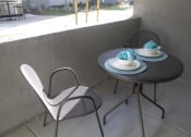 Thumbnail 3 of 75 - a table and chairs on a balcony  at The Crossings at Redlands, Redlands, CA