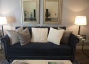 Thumbnail 10 of 75 - a couch with pillows in a living room at The Crossings at Redlands, Redlands, CA, 92374