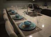 Thumbnail 1 of 75 - a kitchen with a sink and a counter top  at The Crossings at Redlands, California