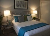 Thumbnail 38 of 75 - a bedroom with a bed in a room at The Crossings at Redlands, Redlands