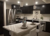 Thumbnail 45 of 75 - a kitchen with black cabinets and a white island at The Crossings at Redlands, California, 92374