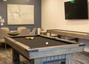 Thumbnail 56 of 75 - a games room with two pool tables and a flat screen tv at The Crossings at Redlands, Redlands, California