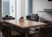 Thumbnail 67 of 75 - a meeting room with a table and chairs at The Crossings at Redlands, California, 92374