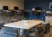 Thumbnail 59 of 75 - a room filled with desks and chairs and computers at The Crossings at Redlands, Redlands, California