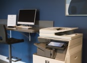 Thumbnail 9 of 75 - a printer and a computer on a desk in an office at The Crossings at Redlands, Redlands, California