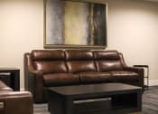 Thumbnail 15 of 75 - a living room with leather couches and a coffee table at The Crossings at Redlands, Redlands, CA, 92374