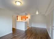 Thumbnail 4 of 11 - Living Room and Kitchen- View 1 at Timberland Park Apartments, Charlottesville
