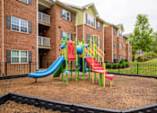 Thumbnail 6 of 11 - Playground - Wide Shot at Timberland Park Apartments, Charlottesville, VA, 22903