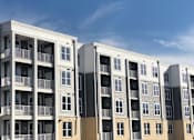 Thumbnail 1 of 13 - Exterior Building at Stone Springs Apartments, Sterling, VA, 20166