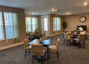 Thumbnail 3 of 33 - Community room with Fireplace at Poland Hill Senior Apartments, Chantilly, VA, 20152