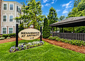 Thumbnail 9 of 17 - A sign that says "Renaissance at Antiquity" is in front of a building.