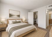 Thumbnail 7 of 17 - A bedroom with a large bed and a painting on the wall.