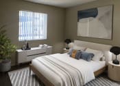 Thumbnail 3 of 12 - a bedroom with a bed and a dresser and a window
