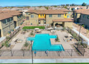 Thumbnail 1 of 60 - Aerial View Of The Pool Area at San Vicente Townhomes in Phoenix AZ