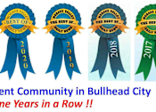 Thumbnail 23 of 24 - A series of ribbons indicating the awarding of the best apartment community in Bullhead City for nine consecutive years.