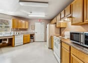 Thumbnail 25 of 36 - Clubhouse Kitchen at Somerset Village in Kingman Arizona