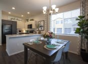 Thumbnail 4 of 23 - Dining Area and Kitchen at San Mateo Townhomes in Phoenix AZ July 2021 2