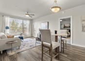 Thumbnail 6 of 48 - Dining area and living room at V on Broadway Apartments in Tempe AZ November 2020 (2)